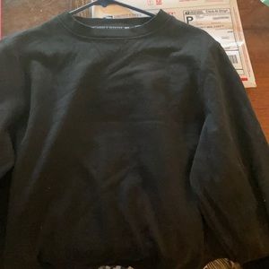 Black young and reckless crewneck never worn.